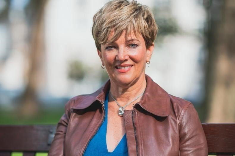 230317 LO sitting on park bench e1709544318164 uai -Empowering Women with their Finances on International Women’s Day | Piercefield Oliver