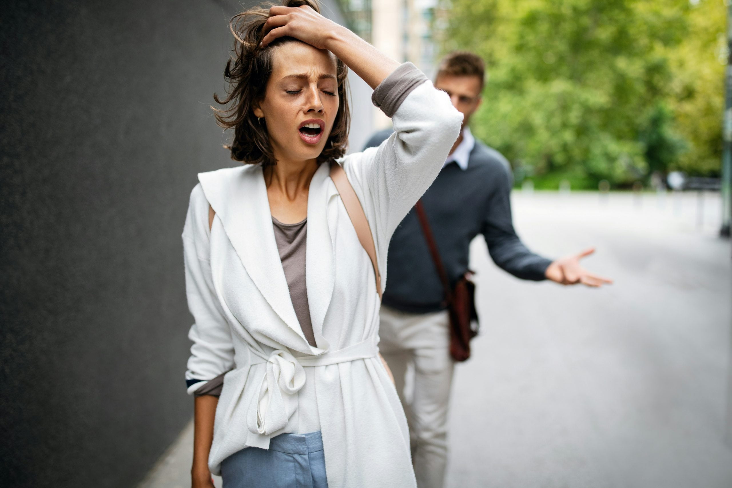 Divorce Women walking away from Man scaled -How to leave your husband or wife - what you need to know | Piercefield Oliver